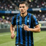 Joueur de l'Inter Milan en action sur le terrain lors d'un match de Ligue des Champions 2026