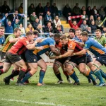 Match de rugby Fédérale 1 Poule 3 avec une mêlée disputée entre deux équipes sur un terrain gazonné